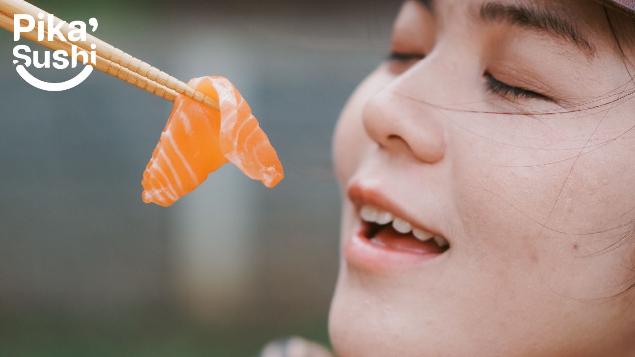 woman eating sashimi